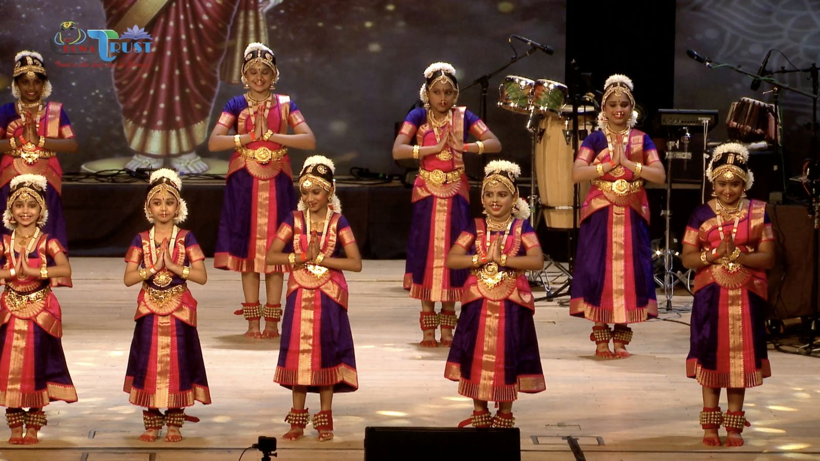 Children performing in front of the LED wall